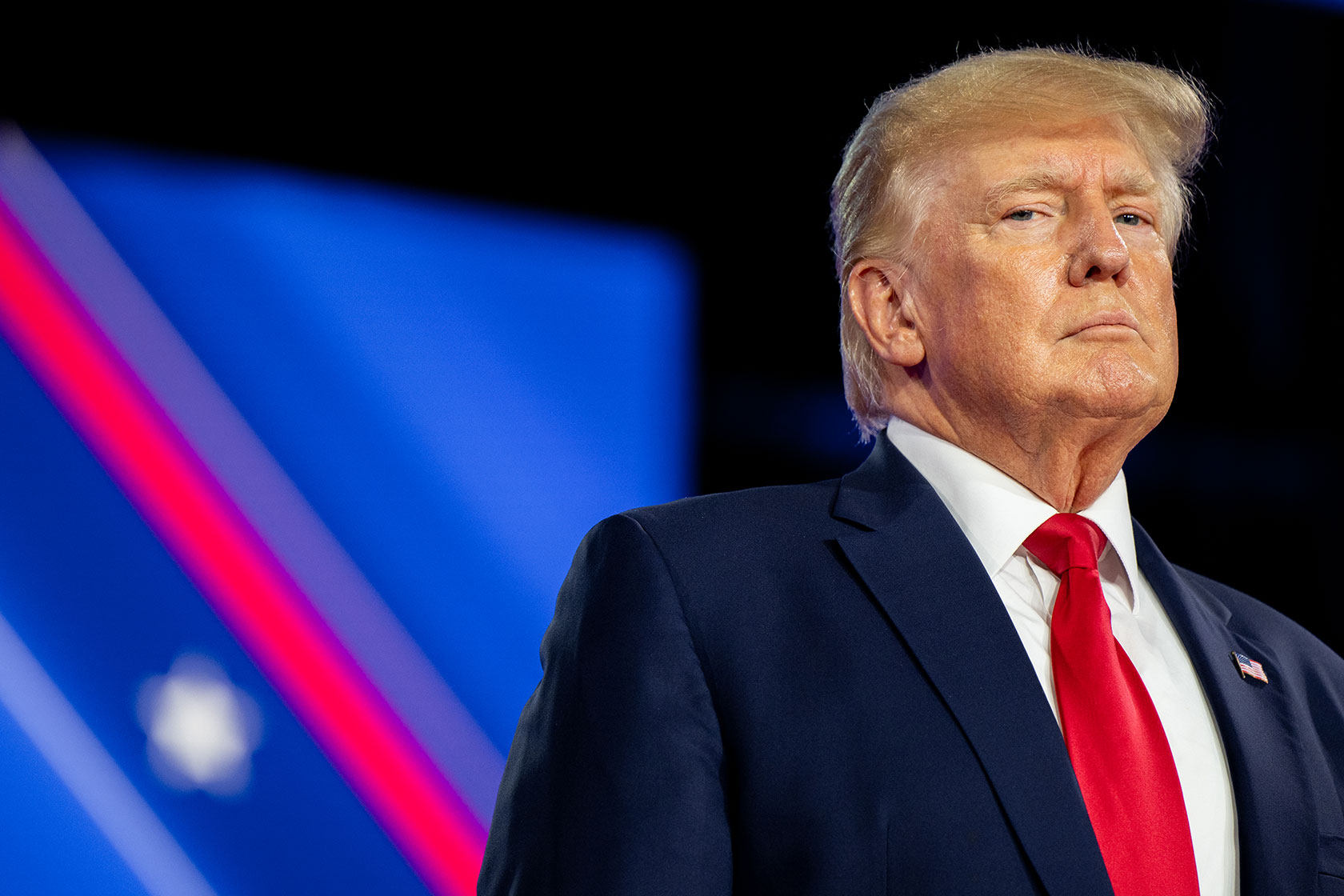 Photo shows Donald Trump wearing a red tie not smiling